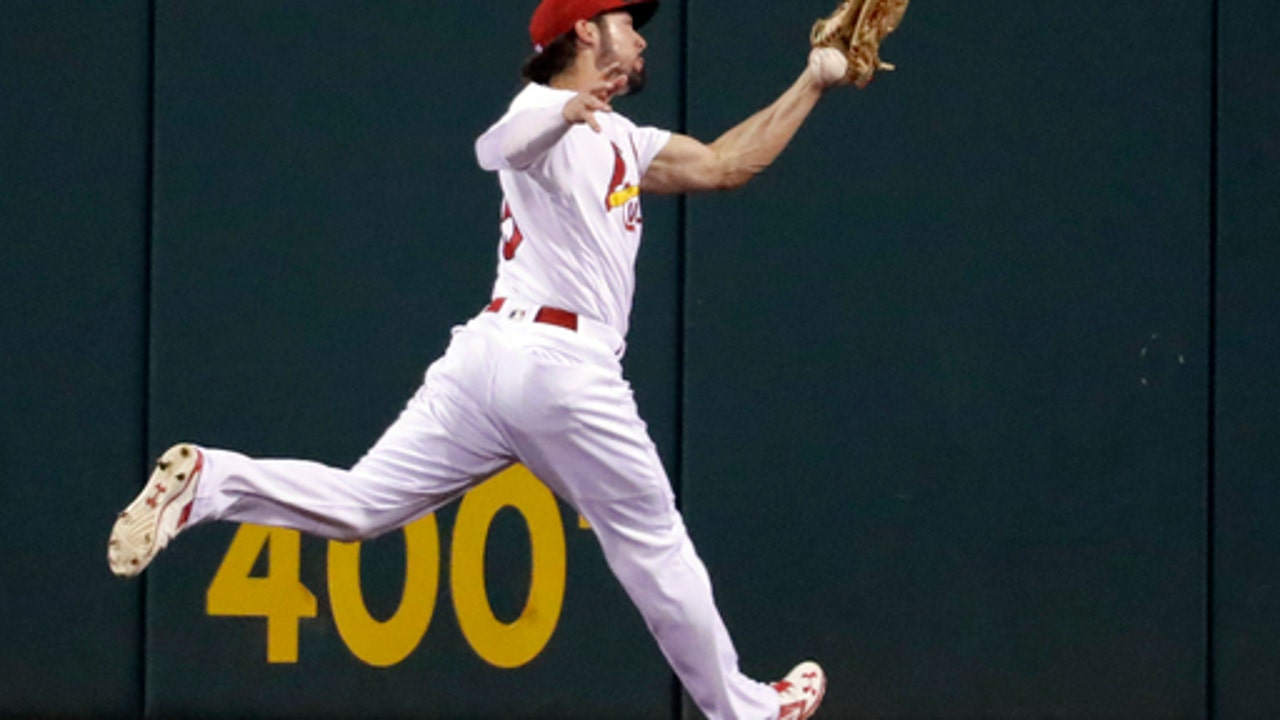 Duvall's single lifts Reds to 2-1 win over Cardinals